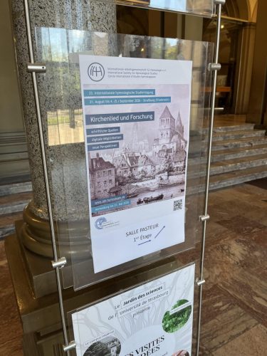 Tagungsplakat im Palais Universitaire